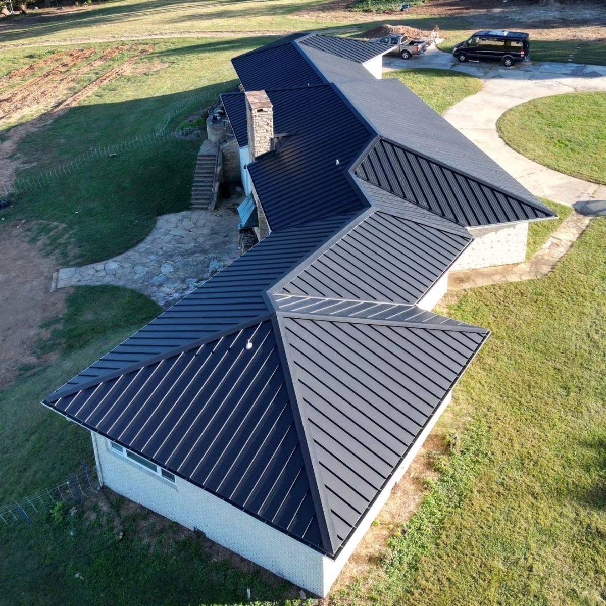 Aerial view of a new standing-seam metal roof installed by Rocky Mountain Home Services